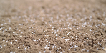 Self-watering soil to reduce water usage in agriculture