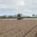 Spraying pre emergence residual herbicide onto potatoes - Lincolnshire, April