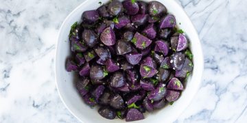 Enhancing the Flavors: Exploring the Delightful Combination of Vitelotte Noir with Herbs and Spices