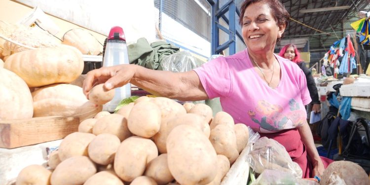 Radica Arjoonsingh calls for locally grown potatoes. PHOTO BY KRISTIAN DE SILVA