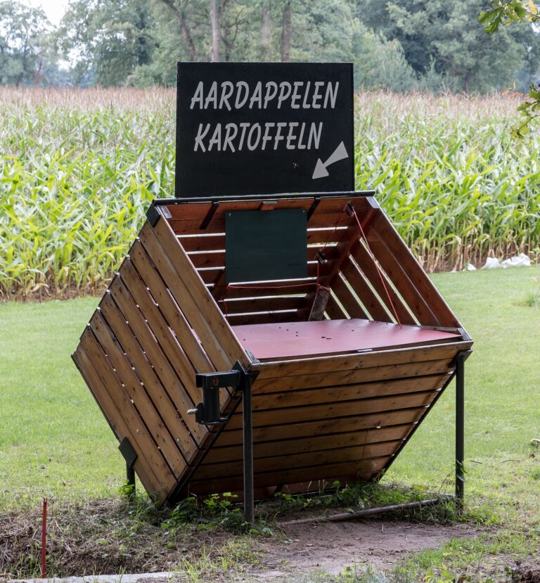 A wooden potato storage box
