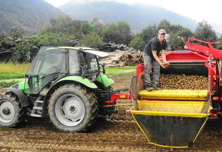 Potato harvesting machine at work in Carinthia, Austria