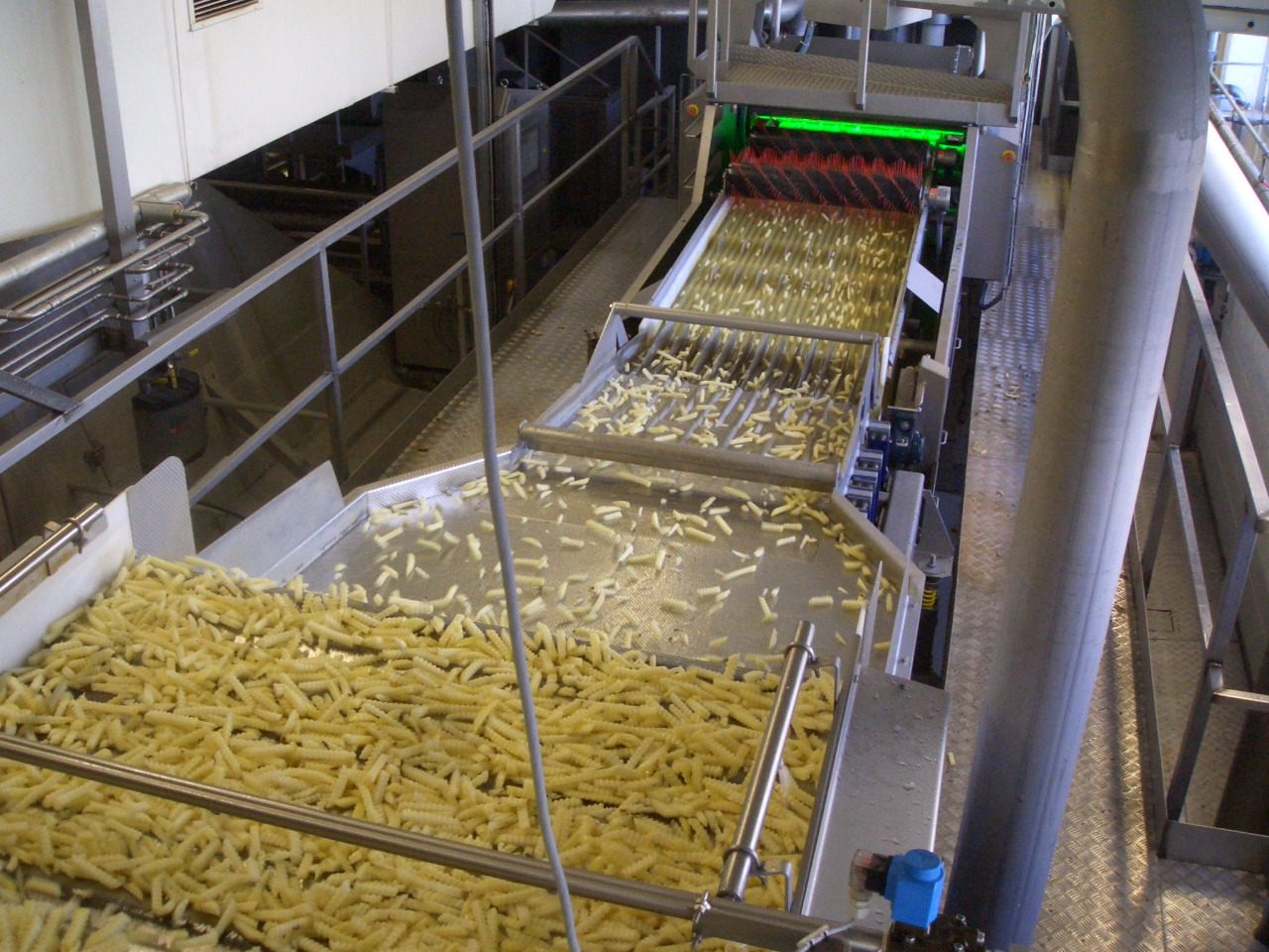 Potato strips on a fries production line
