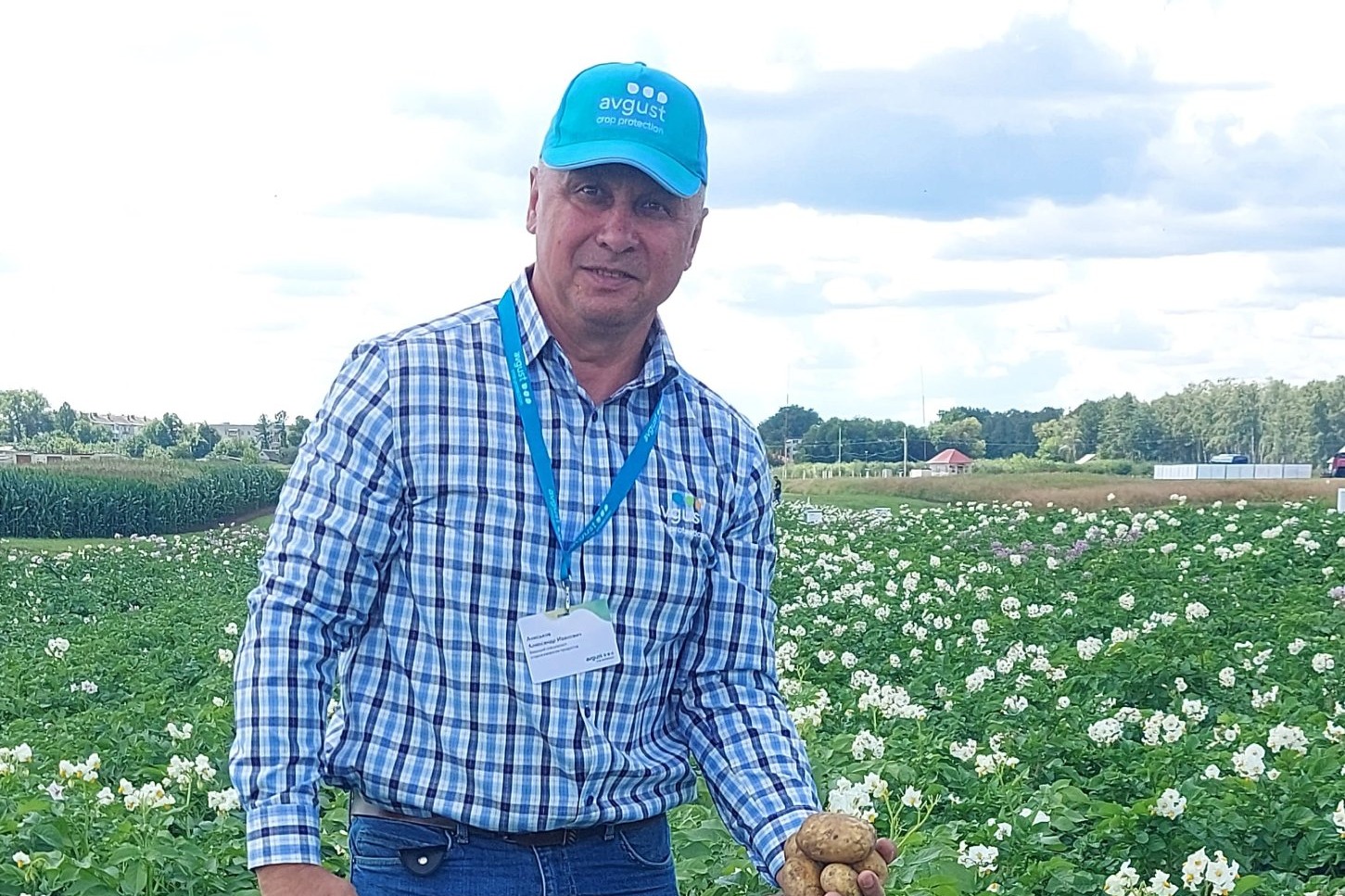 Alexander Aniskov, head of the potato group at Avgust, in a potato field